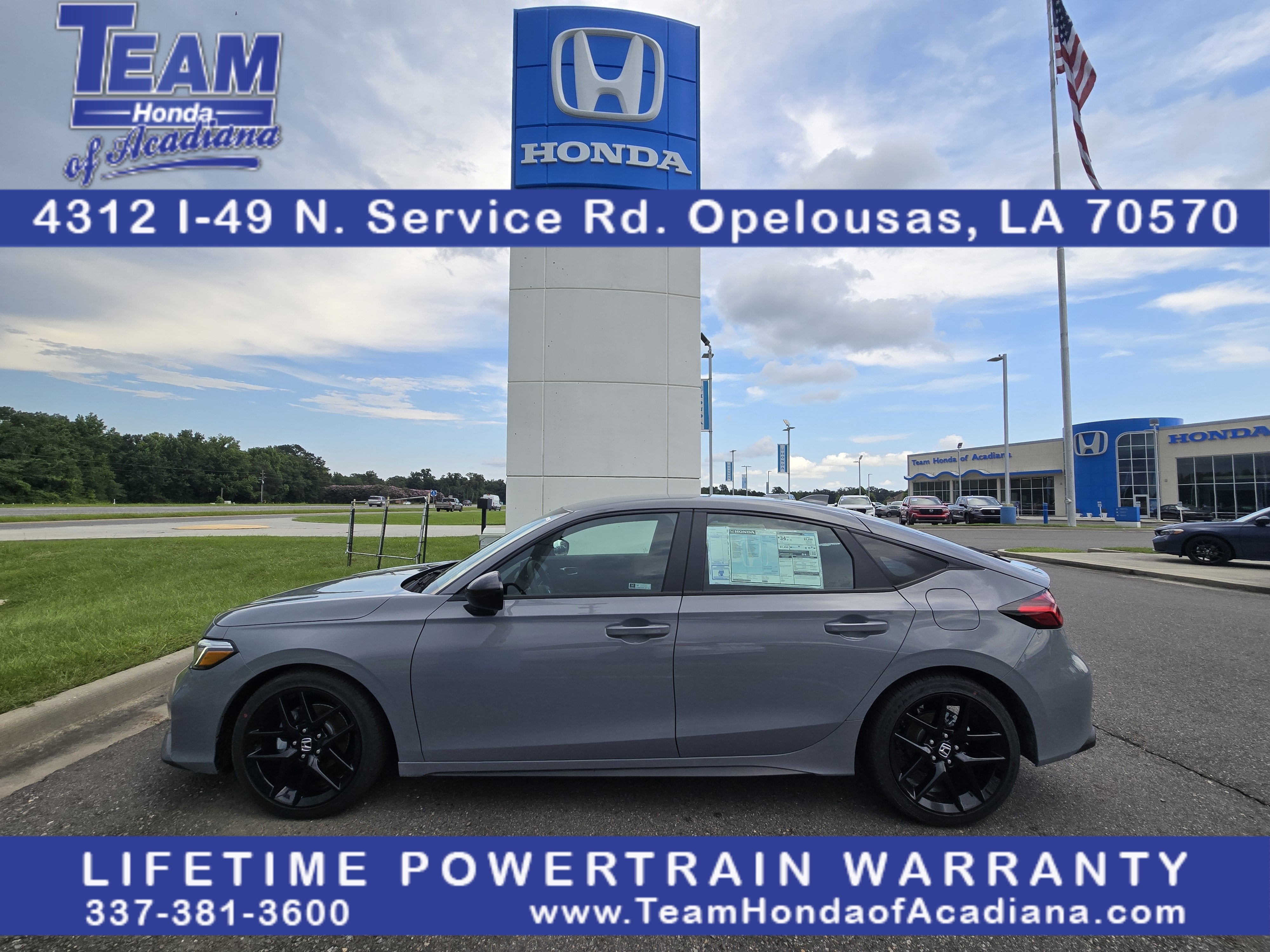 2026 Honda Civic Hatchback Sport in Urban Gray Pearl — front three-quarter view