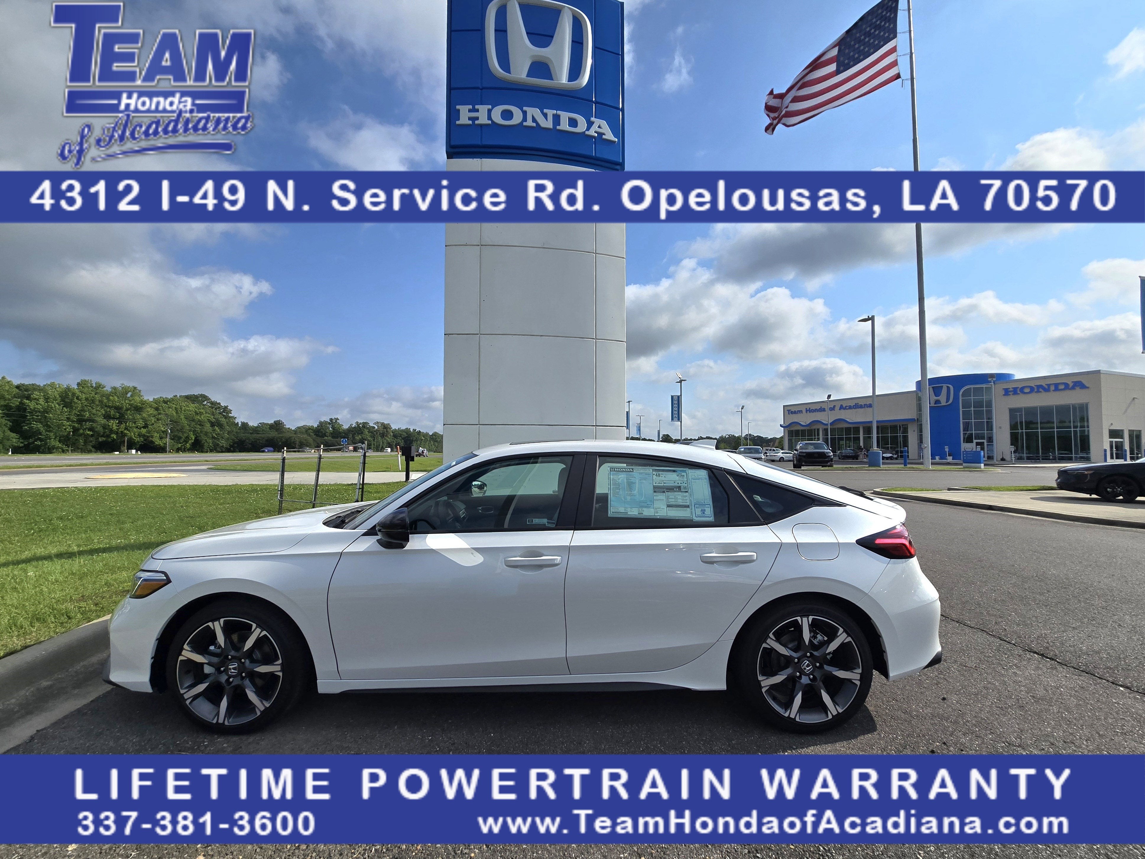 2026 Honda Civic Hatchback Hybrid Sport Touring in Platinum White Pearl — front three-quarter view